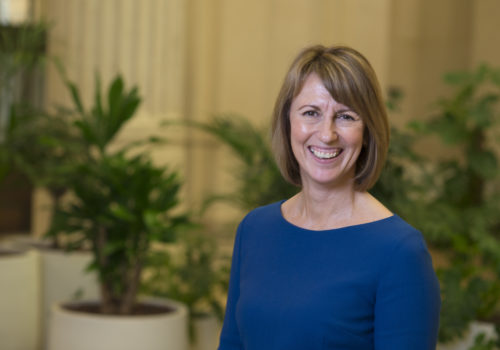 woman smiling at a camera