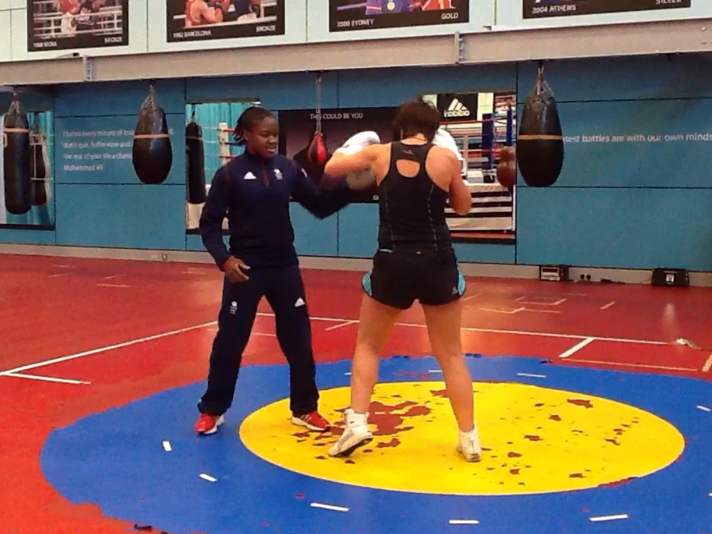 nicola adams sparring in a gym